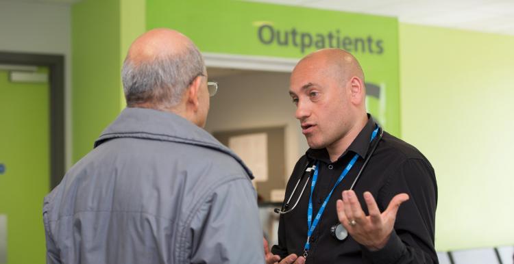 Doctor speaking to a patient in an outpatient clinic