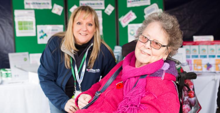 two women promoting Health watch 