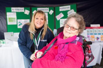 two women promoting Health watch